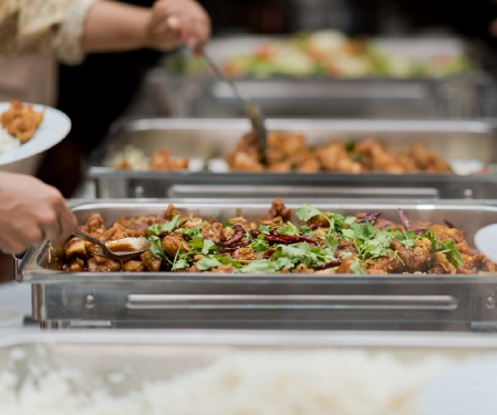 Catering buffet dishes being served