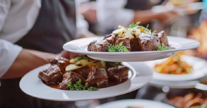 Elegant sit-down served dinner catering with professionally plated meals for formal events and special occasions in Columbus Ohio