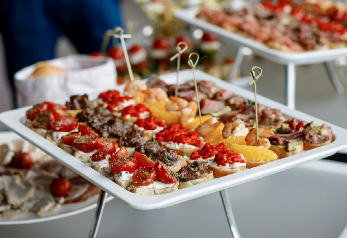 Assorted catered appetizers and hors d'oeuvres arranged on serving trays for a private event in Powell, Ohio.